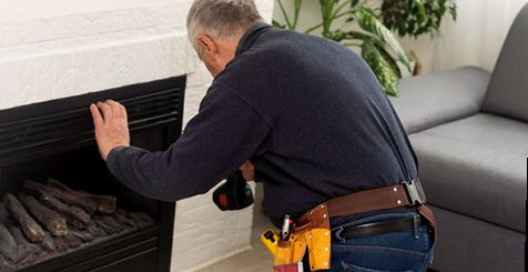 Insert set plumb beneath a mantel